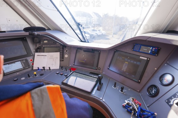 Train driver cabin with control panels and monitors for monitoring, test run on the new Hermann-Hesse railway with Siemens Mireo Plus B trains, Calw, Germany