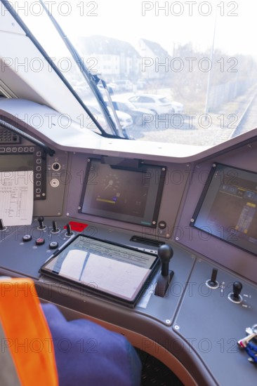 Train driver's cab with modern control monitors and control elements, test run on the new Hermann-Hesse railway with Siemens Mireo Plus B trains, Calw, Germany