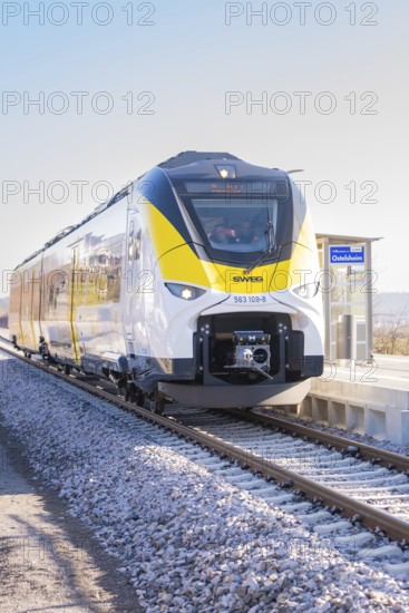 Modern yellow-black train on a sunny platform, test run on the new Hermann-Hesse railway with Siemens Mireo Plus B trains, Calw, Germany