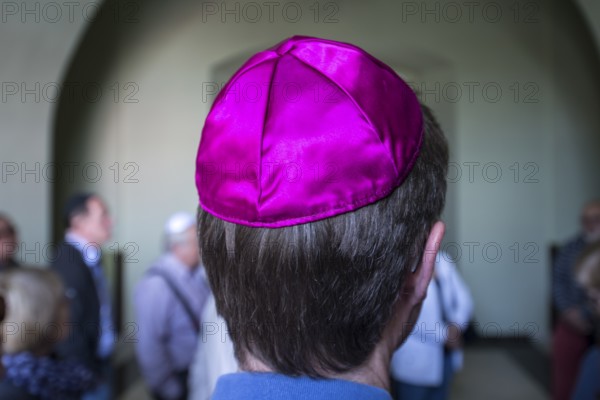 Visitor with a kippah in a synagogue, Ukraine