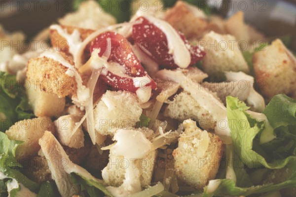 Classic Caesar salad, close-up, natural light, selective focus, horizontal