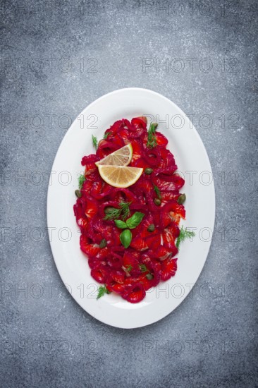 Salmon gravlax with beetroot, Scandinavian snack, beet gravlax, lightly salted fish, homemade, no people