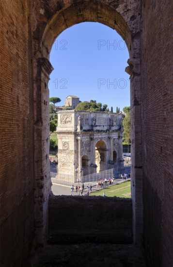 View through round arch of Constantine's Arch from the Colosseum, Rome, Lazio, Italy