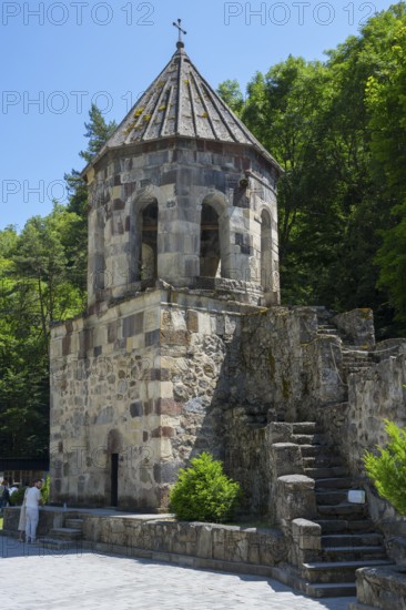 Stone bell tower with stairs in a wooded area, Chitakhevi Church of St. George, The Green Monastery, Mtsvane Monastery, Samtskhe-Javakheti Region, Samtskhe-Javakheti, Georgia