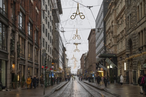 Alexanterinkatu, main shopping street in the city center, designed by Carl Ludwig Engel, Christmas decoration, tram tracks, Helsinki, Finland
