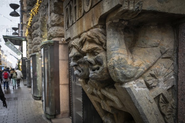 Trolls, stone figures from Kalevala, art nouveau architecture, Pohjola insurance building, Alexanterinkatu, main shopping street in the city center, Helsinki, Finland