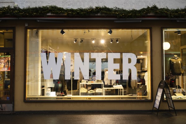 Shop window with the inscription Winter, Helsinki, Finland