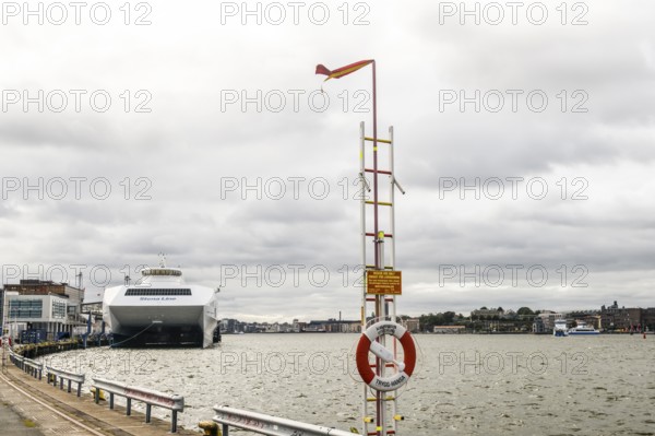 Stena Line fast ferry catamartan in port on a cloudy day with lifebuoy in the foreground, Stena Line Gothenburg-Frederikshavn, Gothenburg, Västra Götalands län, Sweden