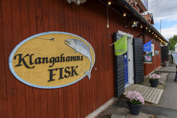 Rustic fish shop Klangahamns Fisk with decorative elements and wooden walls, Sjötorp, Västra Götalands län, Sweden