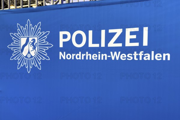 Press photo of the logo and lettering Police of North Rhine-Westphalia, Germany