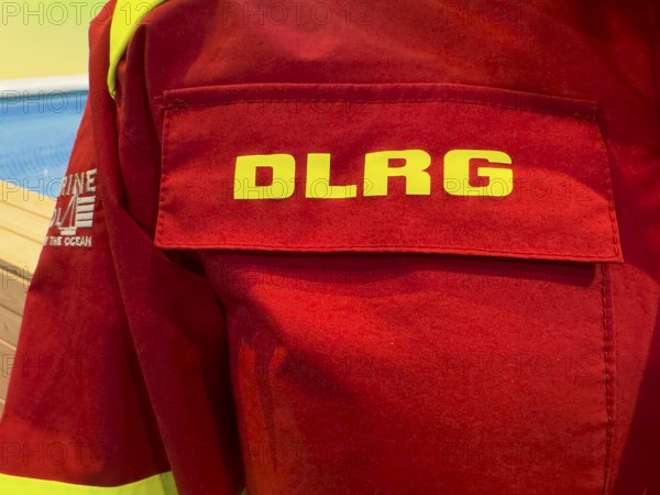 Press photo of DLRG logo on combat clothing from Deutsche Lebens-Rettungs-Gesellschaft e.V., Germany