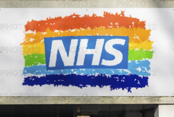 NHS rainbow logo above an entrance, Royal Berkshire hospital, Reading, Berkshire, England, UK