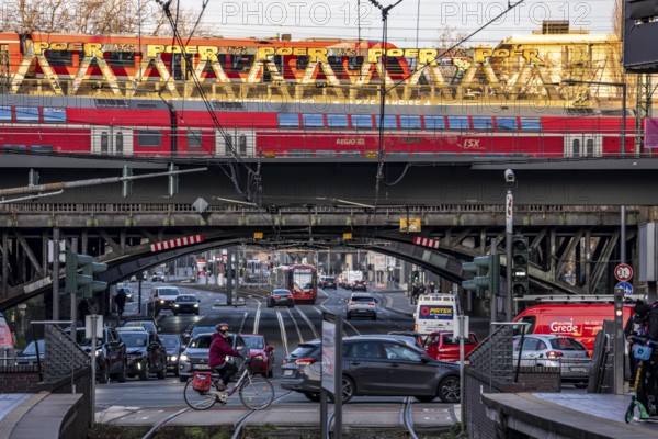 Regional train on the line, railway bridge over Deutz-Mülheimer-Straße, more than 10 tracks crosses the road on 6 bridge structures, tram, platform tracks in front of Cologne-Messe/Deutz station, North Rhine-Westphalia, Germany