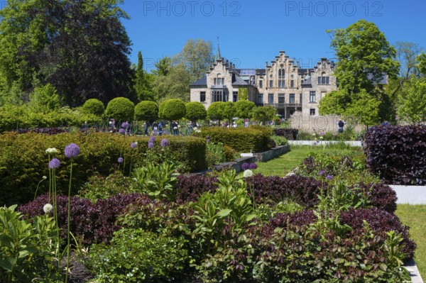 Blooming gardens at Ippenburg Castle, Bad Essen, Lower Saxony, Germany