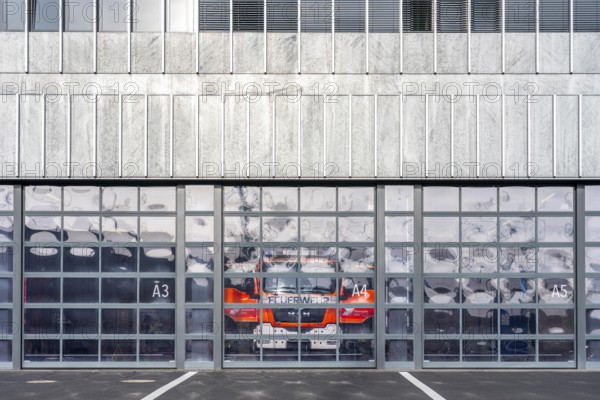 Fire department, fire station, modern guard, silver façade, glass gates, emergency vehicle, fire and rescue station 10, Gummersbacher Straße, Cologne, North Rhine-Westphalia, Germany