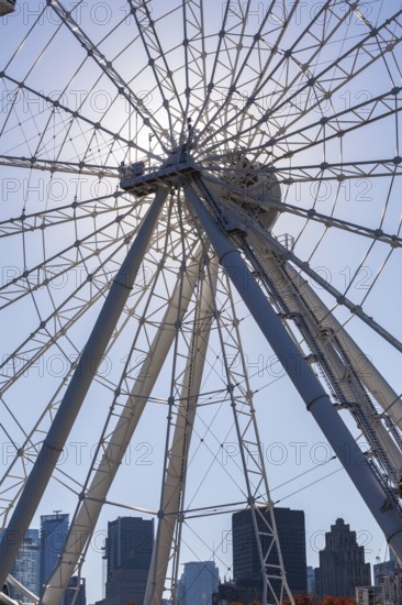 The Montreal Observation Ferris Wheel or La Grande Roue de Montreal amusement ride, Old Port of Montreal, Quebec, Canada. George Ferris (1859–96), is the American engineer who invented the ferris wheel
