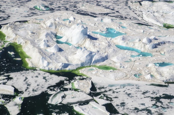 Aerial view of melting icepack and icebergs, Greenland (Kalaallit Nunaat), Arctic Ocean, climate change, global warming, geographically part of North America, politically part of the Kingdom of Denmark