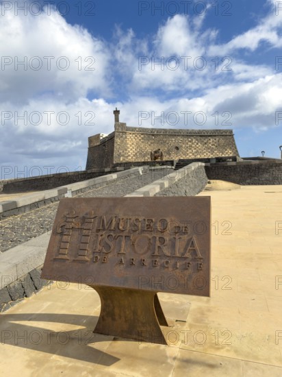 Castillo de San Gabriel fortress against blue sky with white clouds, Arrecife, Lanzarote, Canary Islands, Spain
