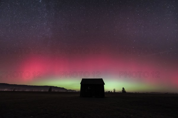 Northern lights, aurora borealis, solar storm, January 2026, red, green, hut, Loisach-Lake Kochel-Moore, Alpine foothills, Bavaria, Germany