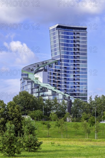Sculpture First Swallows, Pirmosios kregzdes in front of the ARFA Tower, high-rise residential building in the capital city Vilnius, Lithuania
