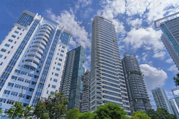 Skyline showing residential high-rise buildings and skyscrapers with flats and apartments in the city Singapore, Southeast Asia