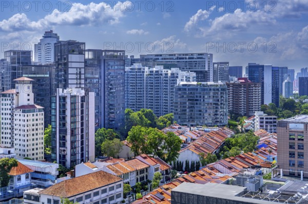 Skyline showing residential high-rise office buildings, houses and skyscrapers with flats and apartments in the city Singapore, Southeast Asia