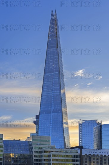 The Shard, glass-clad pyramid-shaped skyscraper and tallest building in the United Kingdom at sunset in Southwark, capital city London, England, UK