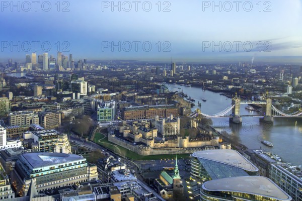 Aerial view from Sky Garden over the Tower of London, Tower Bridge, River Thames and city skyline with skyscrapers in the capital London, England, UK