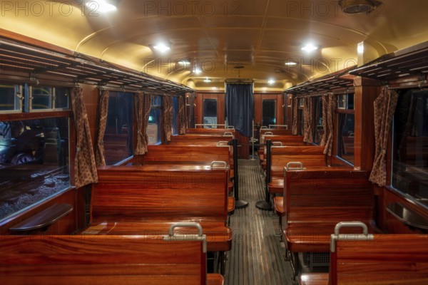 Interior of 1939 railcar, motor car Type 551 with wooden benches at Train World, railway museum in Schaerbeek, Schaarbeek, Brussels, Belgium