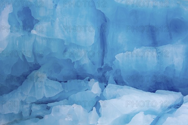 Blue ice wall of Monacobreen, glacier in Haakon VII Land which debouches into Liefdefjorden, Spitsbergen, Svalbard, Norway