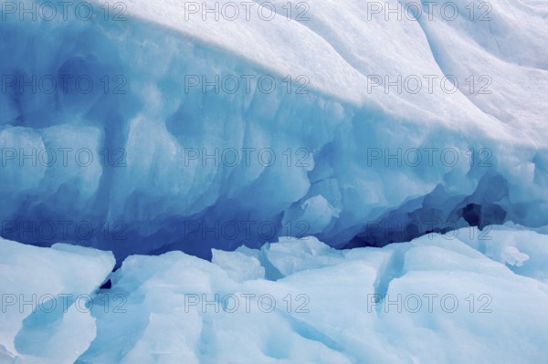 Crevasse in blue ice of Monacobreen, glacier in Haakon VII Land which debouches into Liefdefjorden, Spitsbergen, Svalbard, Norway