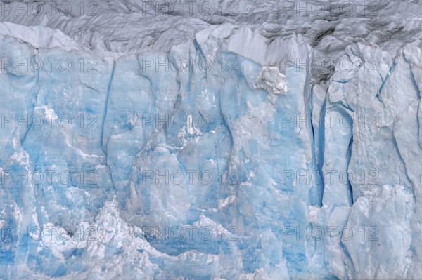 Ice wall of the Monacobreen, glacier in Haakon VII Land which debouches into Liefdefjorden, Spitsbergen, Svalbard, Norway