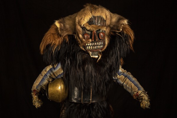 Portrait of traditional hand-carved wooden mask from the Loetschental Carnival, representing folkloric characters, spirits, and demons, Loetschental village, Valais Canton, Switzerland