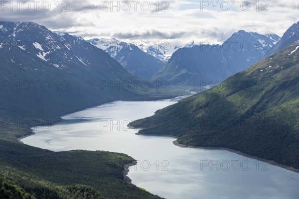 View of blue lake and mountains on Twin Peaks Trail, Eklutna Lake, Chugach Mountains, Chugach State Park, Alaska, USA