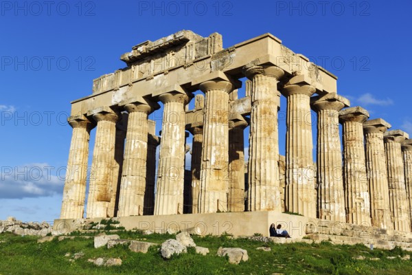Temple E, Temple of Hera in the ancient Greek city of Selinunte, acropolis, Doric style, archaeological site, restoration, tourists, Selinunte, Castelvetrano, Trapani, Sicily, Italy