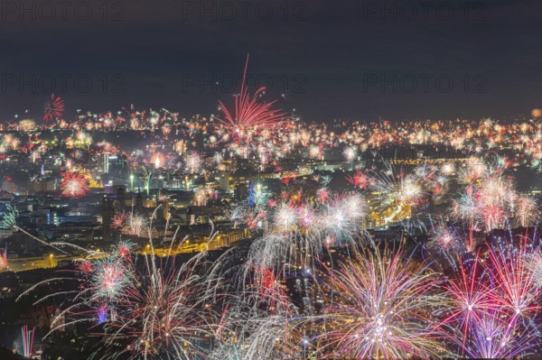 Stuttgart welcomes the new year 2026. Remarkable New Year fireworks over the city center. Stuttgart, Baden-Württemberg, Germany