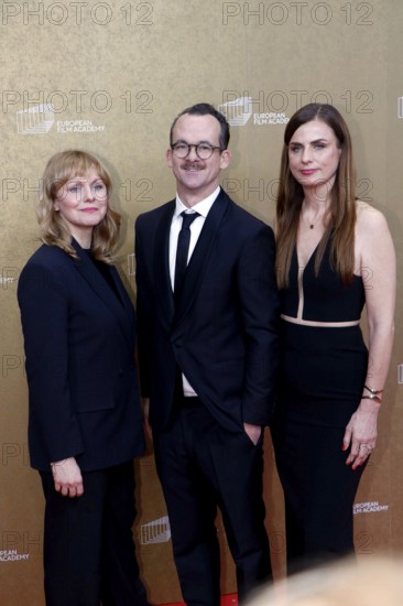 Maren Ade, Joachim Dorn and Janine Jackowski arriving at the European Film Awards at the House of World Cultures in Berlin on 17.01.2026