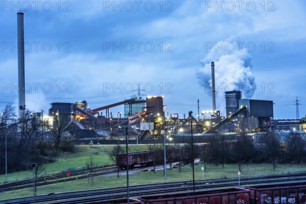 Hüttenwerke Krupp-Mannesmann, HKM in Duisburg, coking plant, fire tower with fire cloud, marshalling yard tracks, North Rhine-Westphalia, Germany