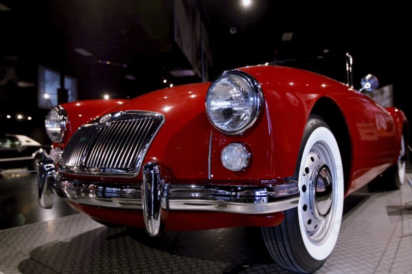 Red classic car with distinctive white tires in a museum fleet, Memphis, Tennessee, USA