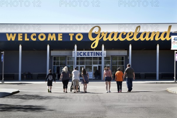 Tourists enter the world-famous Graceland Museum, dedicated to Elvis Presley, Memphis, Tennessee, USA