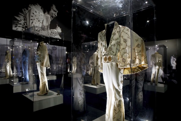 Several decorated stage costumes by Elvis Presley in an exhibition, Memphis, Tennessee, USA