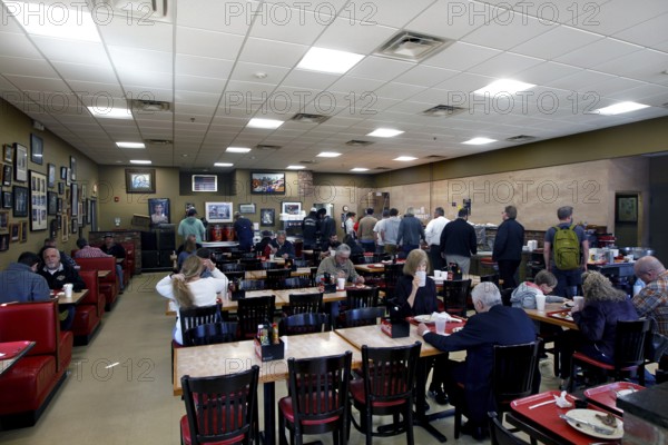 Guests at a retro restaurant serving traditional food in Nashville, Nashville, Tennessee, USA