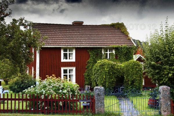 Charming red house with well-kept garden inspired by Astrid Lindgren's Bullerbü, Svedstorp, Småland, Sweden