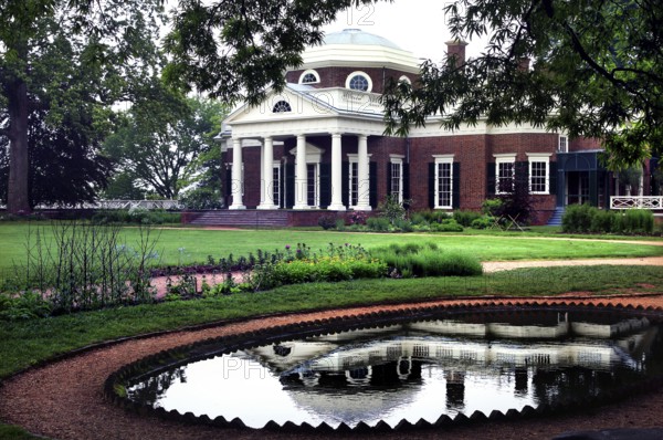Jefferson's house and flower garden in Monticello next to a tranquil fishing pond, Charlottesville, Virginia, USA
