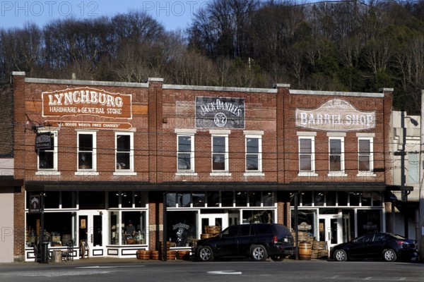 Historic brick buildings with eye-catching signs in Lynchburg, Lynchburg, Tennessee, USA
