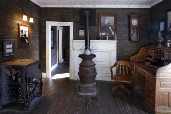 Office with antique furniture and a fireplace at Jack Daniel's Distillery, Lynchburg, Tennessee, USA