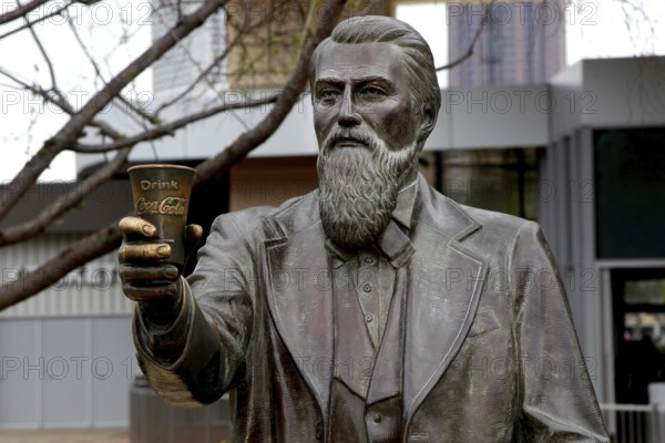 Statue of John Pemberton, inventor of Coca-Cola, presents a glass, Atlanta, Georgia, USA
