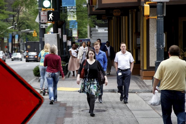 Pedestrians liven up Peachtree Street in bustling Atlanta, Atlanta, USA
