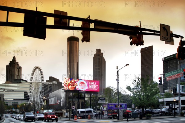 Evening atmosphere in downtown Atlanta with skyline and busy street scene, Atlanta, Georgia, USA