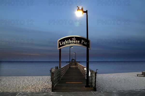 The Biloxi pier at dusk with a view of the ocean, Biloxi, Mississippi, USA